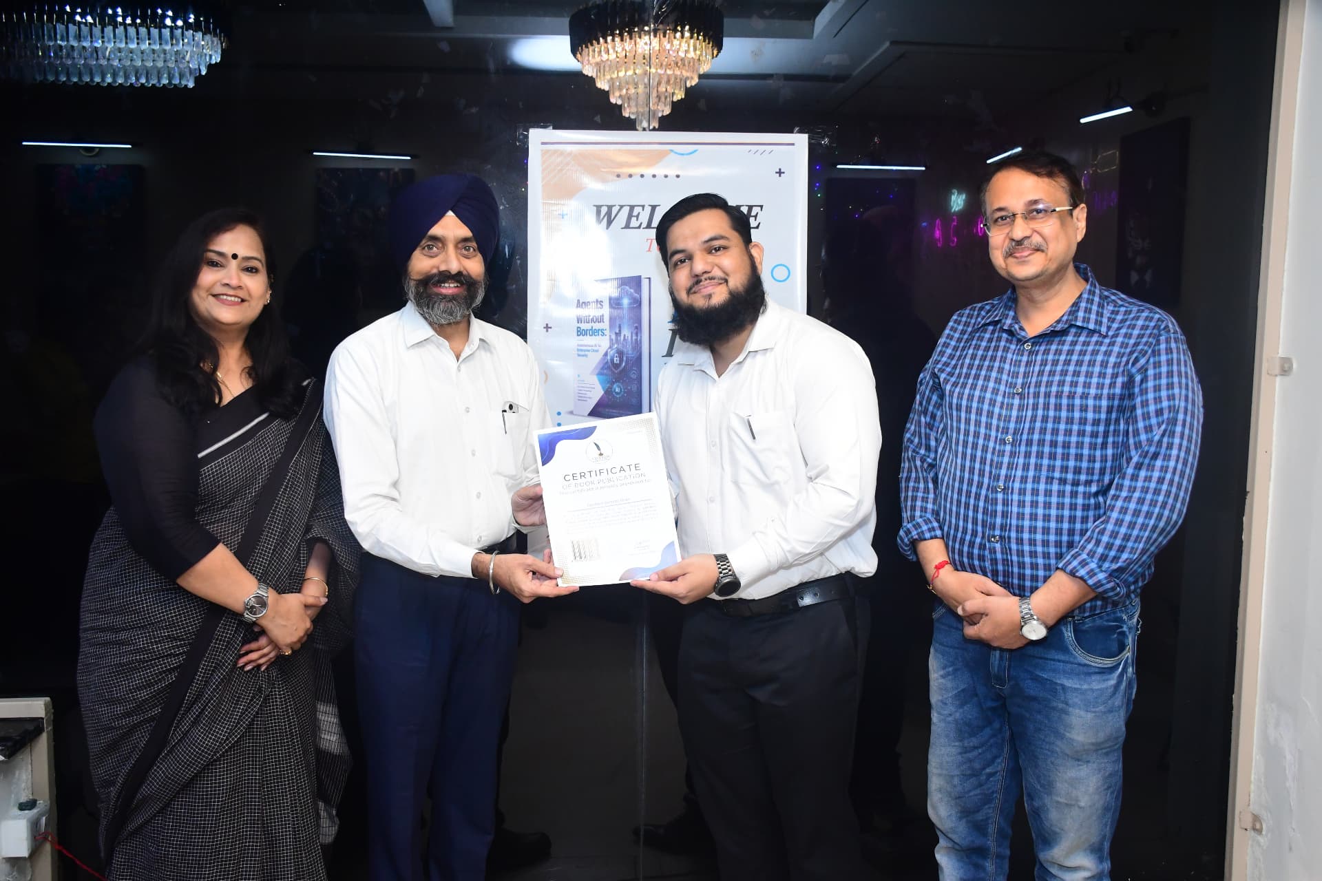Fardeen Ahmad Khan and co-authors with the book publication certificate at the Agents Without Borders launch event