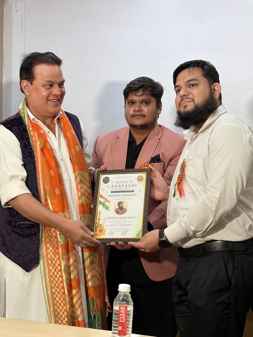 Fardeen Ahmad Khan being felicitated by Dr. Anis Beg with a certificate of honour for his poetic works
